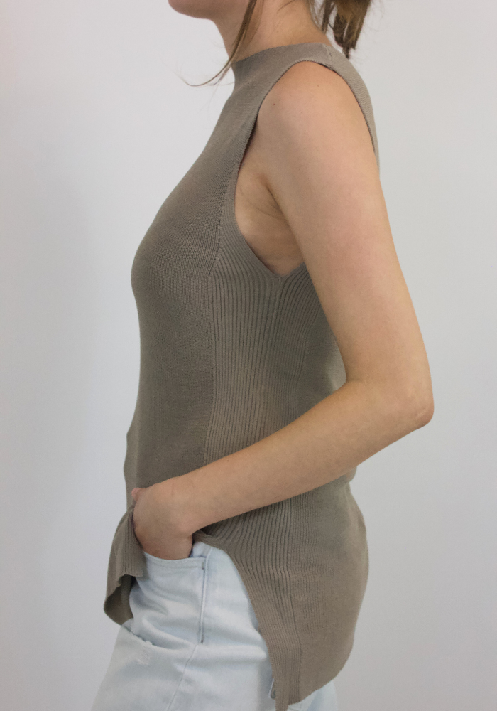 Hayden is a luxurious essential for any wardrobe. Crafted of high quality taupe knit fabric, its elegant silhouette is flattering and sophisticated.