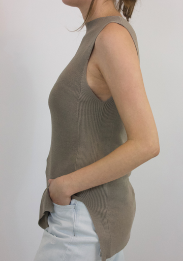 Hayden is a luxurious essential for any wardrobe. Crafted of high quality taupe knit fabric, its elegant silhouette is flattering and sophisticated.